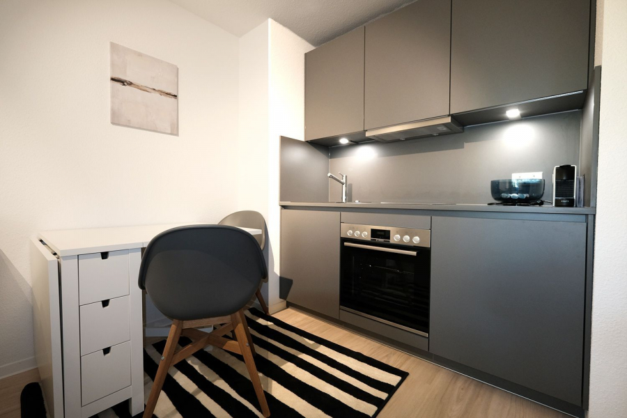 Moderne Küche mit Esstisch - Möbliertes Apartment direkt am Feuersee!